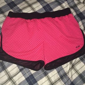 Black and pink running shorts